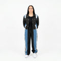 Completo sportivo nero e azzurro