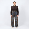 Jeans wide leg con fiori in velluto