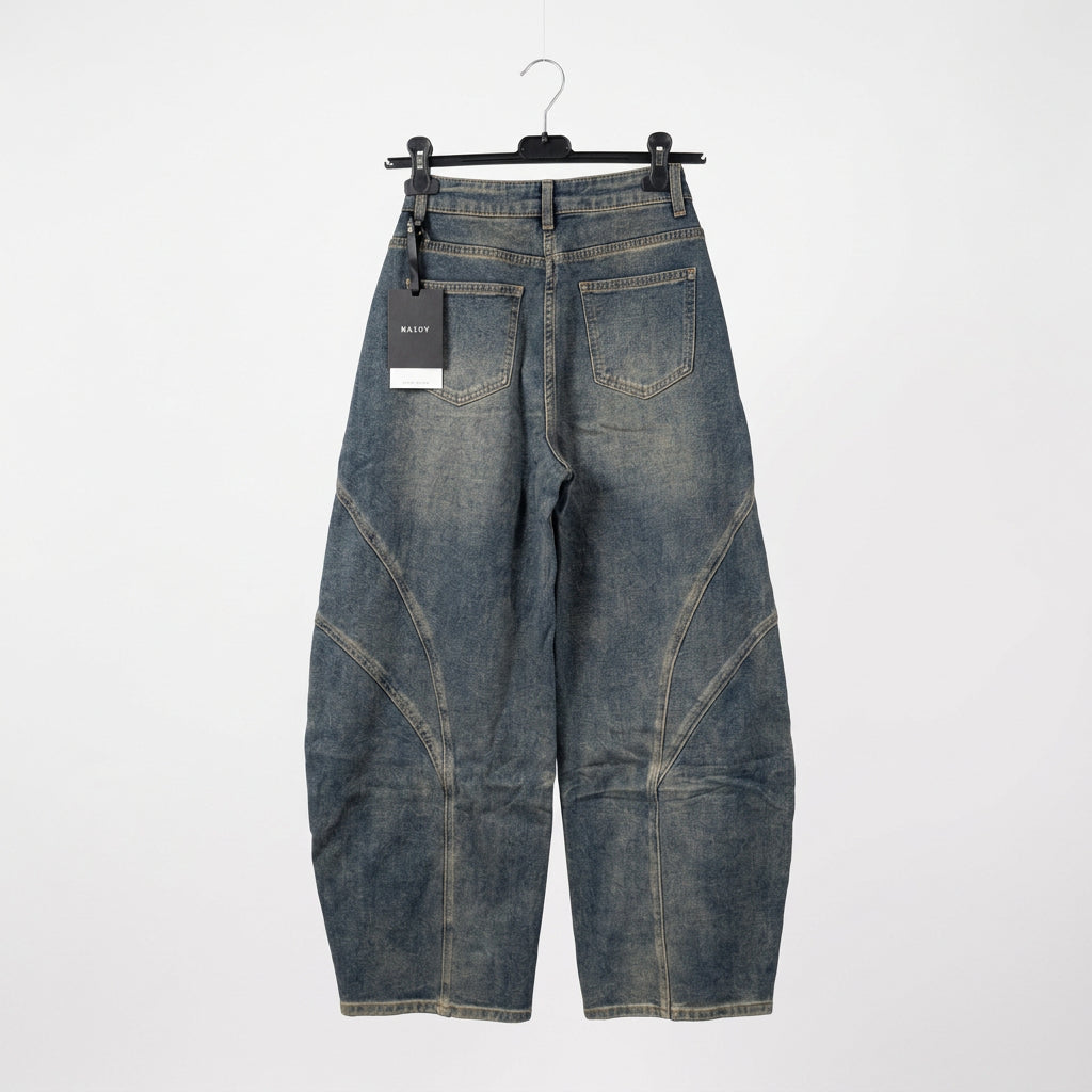 Jeans barrel con inserti gialli