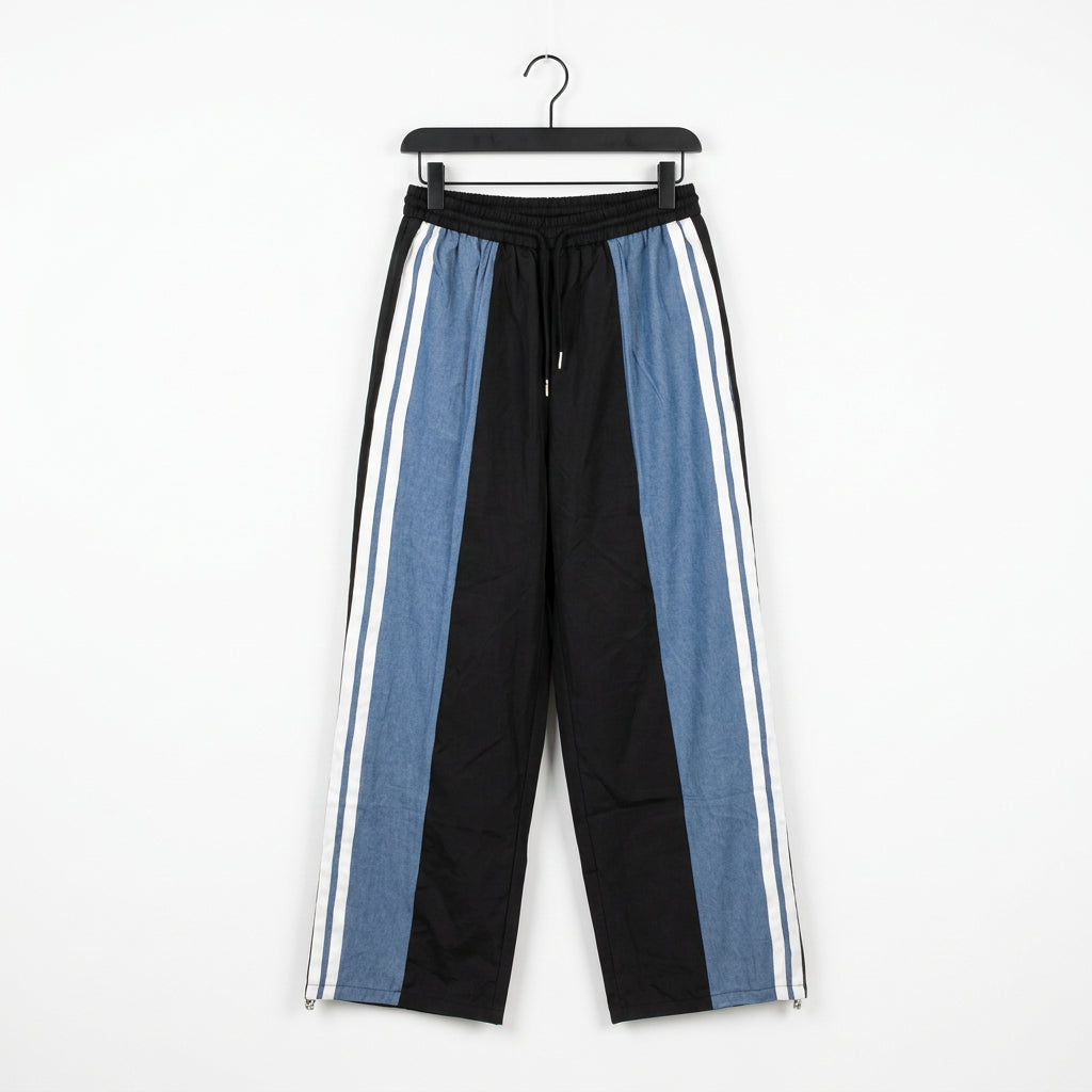 Completo sportivo nero e azzurro