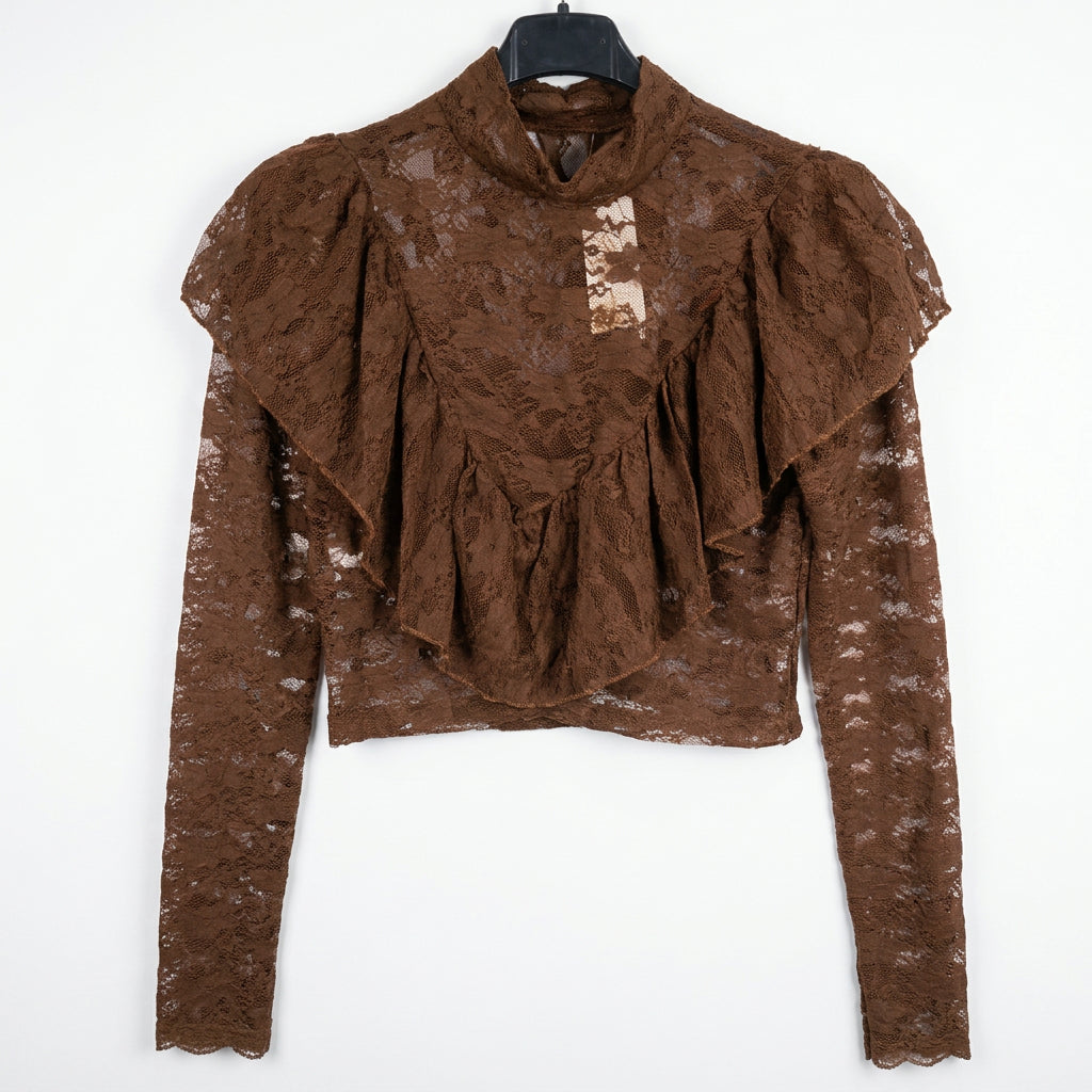 Maglia in pizzo con volant